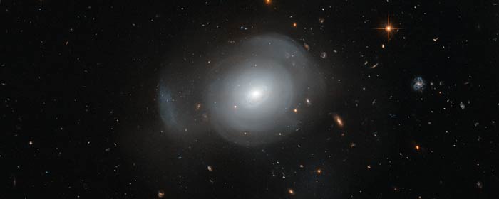 Galactic Merger Leaves Pale Rose in The Sky