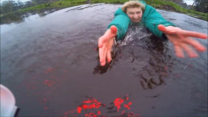 Man Braves Freezing Water To Rescue Drone
